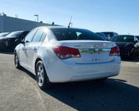 KBB.com 10 Best Sedans Under $25,000. This Chevrolet Cruze boasts a Turbocharged Gas I4 1.4L/83 engi... (image 2)
