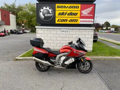 BMW K1600GT 2014 avec 128 000 KM de couleur Shakir orange. Équipé de top case, cruise contrôle, lumi...