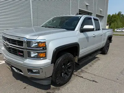 Engine: 8 Cylinder Engine 5.3L/325CI L/100Km City: 14.9 L/100Km Hwy: 10.7