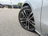 Experience the thrill of effortless performance and sophisticated style behind the wheel of this 202... (image 9)
