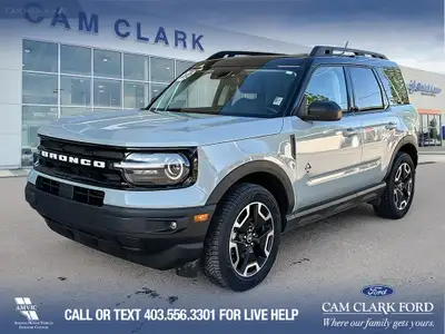 This 2022 Ford Bronco Sport Outer Banks in Cactus Grey is the perfect blend of rugged utility and re...