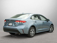 This Toyota Corolla boasts a Gas/Electric I-4 1.8 L/110 engine powering this Variable transmission.... (image 4)