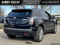 The 2023 Cadillac XT5 AWD Sport in a sleek black exterior blends luxury and performance with all-whe... (image 2)