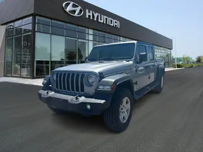 The 2020 Jeep Gladiator Sport S is a midsize pickup truck that combines Jeep's legendary off-road ca...
