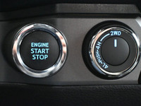 Introducing the sleek blue 2023 Toyota Tacoma. This truck is packed with various features to make yo... (image 8)