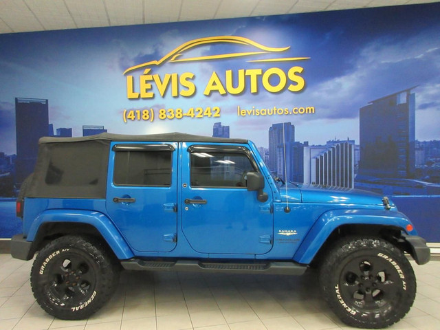 JEEP WRANGLER UNLIMITED 2014 UNLIMITED SAHARA TOIT DUR ET SOUPLE in Cars & Trucks in Lévis