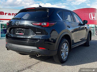 Experience the confident handling and sleek style of this 2024 Mazda CX-5 GS. Boasting a low 35,730k... (image 5)