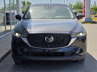 This AWD Mazda CX5 offers heated front seats, Keyless Entry/Start, Remote Engine Start, and Smart De... (image 6)