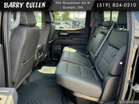 Experience the 2025 Chevrolet Silverado 1500 LT Trail Boss, an impressive black 4x4 truck designed t... (image 6)