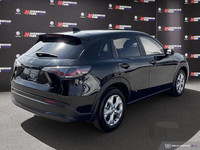 The *2025 Honda HR-V LX AWD* blends urban practicality with all-weather confidence. With bold new st... (image 5)