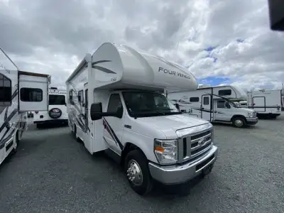 Thor Motor Coach Four Winds Class C gas motorhome 22E highlights: Queen Bed Cab Over Bunk 40in.in. T...
