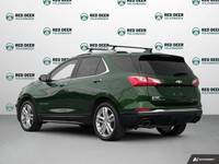 The 2018 Chevrolet Equinox Premier AWD in a striking green finish offers a dependable and confident... (image 4)