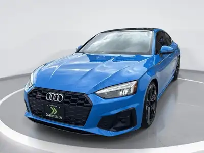 Meet the Audi S5 Sportback Technik in a striking turbo blue with AWD for exceptional handling and pe...
