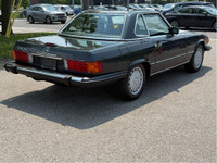 Step into timeless elegance with this beautifully preserved 1989 Mercedes-Benz 560SL, the final mode... (image 2)
