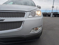 The 2012 Chevrolet Traverse LTZ is a stylish and versatile SUV, presented in Silver Ice Metallic wit... (image 2)