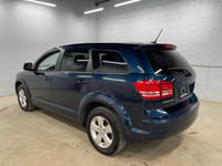 Looking for a versatile SUV that's ready for anything? Check out this sleek, blue 2014 Dodge Journey... (image 3)