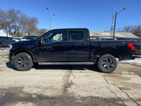 The 2025 Ford F-150 Lightning Lariat is a revolutionary electric pickup truck that embodies the perf... (image 1)