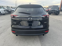 Elevate your drive with the 2023 Mazda CX-9 GS, a three-row SUV that combines luxury, performance, a... (image 3)