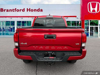 Conquer any terrain with this 2023 Toyota Tacoma Crew Cab Pickup. Its robust four-wheel-drive system... (image 4)
