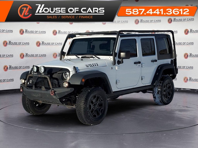  2014 Jeep WRANGLER UNLIMITED 4WD 4dr Sport in Cars & Trucks in Calgary