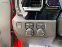 The 2025 Chevrolet Silverado 1500 LT makes a bold statement with its eye-catching Red Hot exterior p... (image 9)