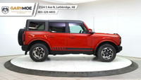 Experience the power and style of the red 2023 Ford Bronco Outer Banks 4 Door Advanced 4x4, boasting... (image 5)