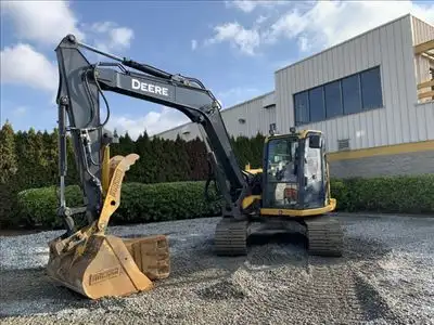 Hours: 5003 | Location: Surrey, BC, CA | Arms: Medium Arm; Buckets: w/ Bucket; Operators Station: RO...