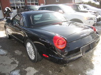 AUTOMATIC. FINISHED IN BLACK WITH TWO TONE BLACK AND RED LEATHER INTERIOR. COMES WITH HARD TOP, CAR... (image 2)
