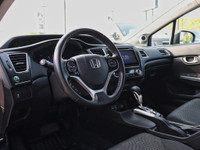 Experience the perfect blend of efficiency, comfort, and modern features with the 2015 Honda Civic E... (image 7)