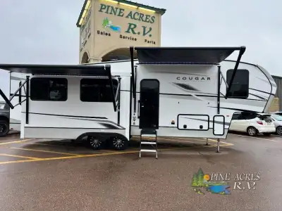 Keystone Cougar Half-Ton fifth wheel 29RLISE highlights: Kitchen Island 8740 Lbs Dry Weight Opposing...
