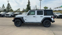 This 2025 JEEP WRANGLER 4-DOOR SPORT has the following options Cloth Low-Back Bucket Seats, Uconnect... (image 5)