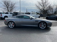 Experience luxury and performance with our exquisite Silver Aston Martin DB9 2dr Coupe Automatic. De... (image 5)