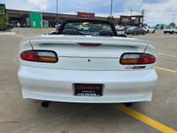 Unleash raw American muscle this summer with this stunning 2002 Chevrolet Camaro Z28 Convertible. Po... (image 7)