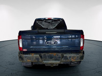 The 2019 Ford Super Duty F-350 SRW Lariat, in a striking blue with a 44 drivetrain, offers exception... (image 5)