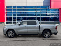 This Ram 1500 has a durable Twin Turbo Premium Unleaded I-6 3.0 L/183 engine powering this Automatic... (image 1)