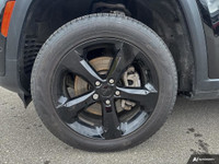 The 2024 Jeep Grand Cherokee L Limited 4x4 in striking Diamond Black Crystal Pearl is a sophisticate... (image 5)