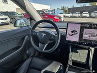 This Tesla Model Y delivers a Electric engine powering this Automatic transmission. Window Grid Ante... (image 8)