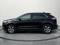 Up for sale is a well-maintained 2019 Ford Edge SEL, featuring a sleek black exterior and a rare tan... (image 2)
