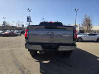 This brand new CARBONIZED GREY METALLIC 2025 FORD F-150 LIGHTNING FLASH is powered by an ELECTRIC EN... (image 7)