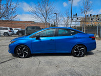 Buckle up, because this 2023 Nissan Versa SR CVT in Electric Blue Metallic isnt just a carits your t... (image 2)