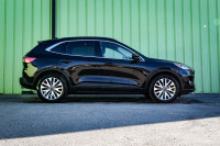 This 2021 Ford Escape is for sale today. This SUV has 84,209 kms. It's black in colour . It has an a... (image 1)