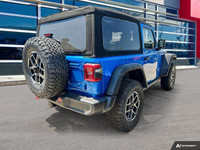 This Jeep Wrangler has a trusty Regular Unleaded V-6 3.6 L/220 engine powering this Manual transmiss... (image 5)