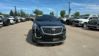This Cadillac XT5 is equipped with: Leather Seating Surfaces w/Mini Perforated Inserts, Power moonro... (image 7)