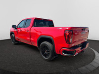 This 2025 GMC Sierra 1500 in Cardinal Red is equipped with 4WD and Turbocharged Diesel I6 3.0L/183 e... (image 2)