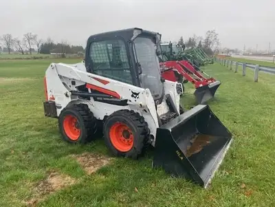 2018 Bobcat S550, 829 HRS, A51 Package, cab enclosure heat & air, rear weight kit, polycarbonate doo...