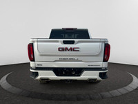 The All New GMC Sierra has been redefined from Hood to Hitch. This 4WD White Sierra is a Crew Cab Pi... (image 3)