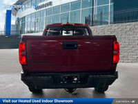 Get behind the wheel in our used 2021 Chevrolet Colorado ZR2 Crew Cab short box 4X4 in Cherry Red Ti... (image 3)