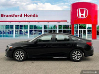 This 2022 Honda Civic Sedan LX boasts a sleek black exterior and a surprisingly spacious interior, p... (image 1)