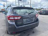 Do not miss out on this low mileage, locally owned and traded 2019 Subaru Impreza Touring! Nicely op... (image 6)