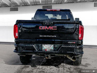 The 2023 GMC Sierra 2500 AT4 includes four-wheel drive, heated and ventilated front seats, a heated... (image 4)